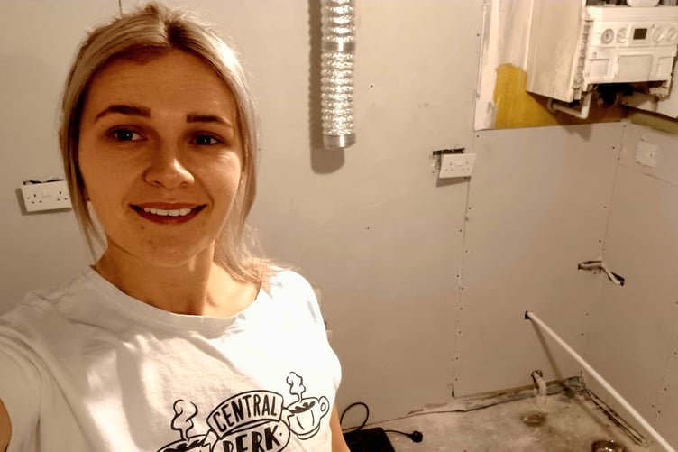 VICTORIA in her kitchen, which is now starting to look bright and new again thanks to help from local people