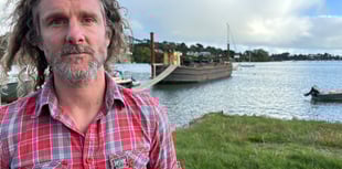 Father faces £20,000 costs over barge home 