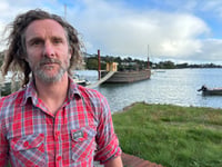 Father faces £20,000 costs over barge home 