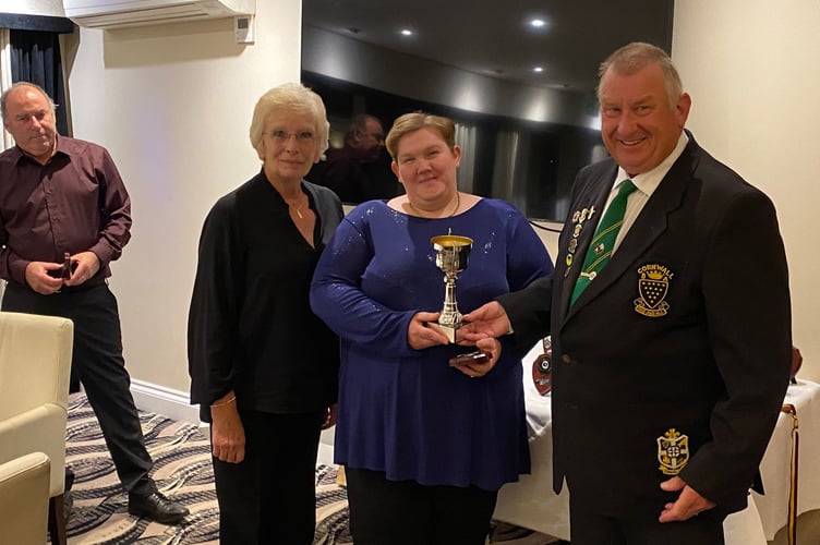 The Ladies' Thomas Pairs champions Joyce Barrett (left) and Lisa Stubbs with outgoing Group Three chairman Malcolm McCarthy.