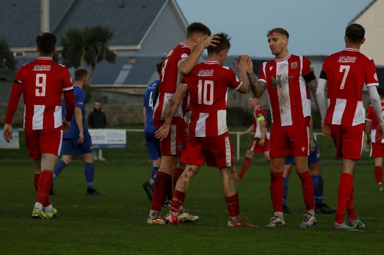 Newquay congratulate Jacob Grange (10) after scoring the Peppermints' fifth of the afternoon. Picture: Ingrid Morrison