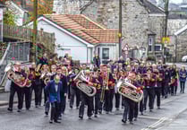 Service of remembrance and parade in village