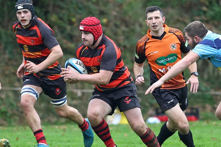 Liskeard-Looe's James Noel-Johnson, pictured with ball in-hand, was the Lions' man of the match. Picture: Glen Rogers