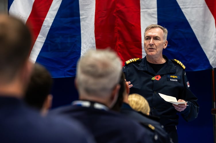 The Chief of the Defence Staff Admiral Sir Tony Radakin meets personnel at 700X Naval Air Squadron, based at RNAS Culdrose. Five years ago, when he was First Sea Lord, Admiral Radakin directed the fleet Air Arm squadron to begin trials with drones. They are regularly deployed on warships around the world. He was given demonstrations of the squadron Puma, Banshee and Peregrine remotely-piloted air systems.
The Chief of the Defence Staff Admiral Sir Tony Radakin talks to sailors and civilians from across RNAS Culdrose during a visit to the Cornish air station. The event was held in the hangar of 700X Naval Air Squadron.
The Chief of the Defence Staff Admiral Sir Tony Radakin presents Lieutenant Commander Ian âNurseyâ Mailes with his valedictory certificate after he retired from the Royal Navy after 34 yearsâ service. Lt Cdr Mailes served as a helicopter observer in Sea King and Merlin aircraft, based mainly out of RNAS Culdrose.
The Chief of the Defence Staff Admiral Sir Tony Radakin presented a valedictory certificate to Lieutenant Commander Alastair âBouncyâ Castle years. They both served together in 1990 on their first ship as lieutenants and have remained good friends. Lt Cdr Castle trained as a pilot in Sea King and Merlin helicopters and has spent most of his career at RNAS Culdrose.