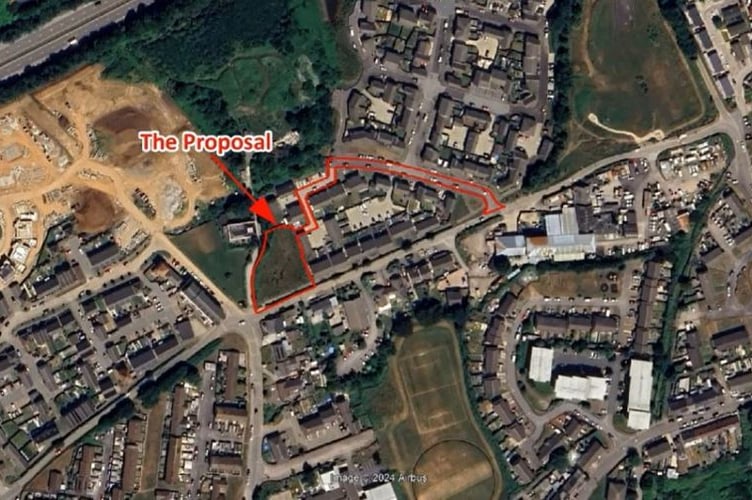 An aerial photograph showing where the new houses would be built.