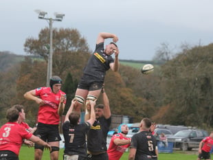 Rowley's late brace keeps CABs in touch with the top two