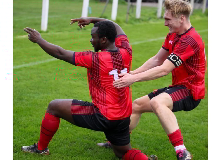 Dobwalls will hope for more celebrations like this at Callington Town. Pictured is skipper Charlie Castlehouse congratulating Kaycee Ogwu for the opening goal of their recent victory over Launceston. Picture: Colin Hilton