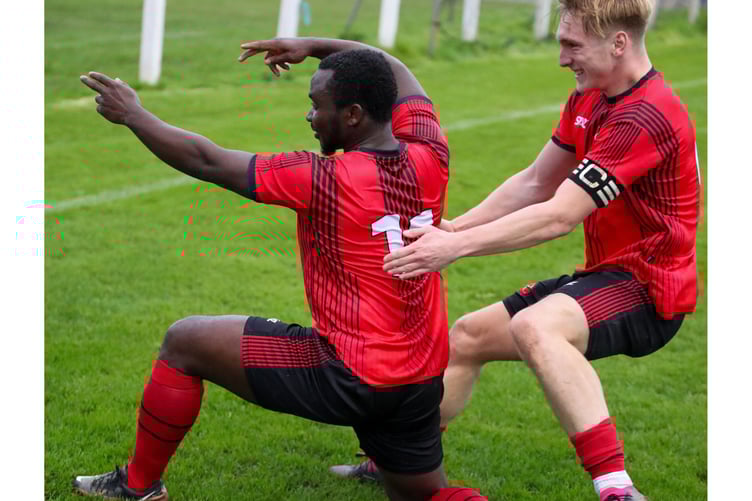 Dobwalls will hope for more celebrations like this at Callington Town. Pictured is skipper Charlie Castlehouse congratulating Kaycee Ogwu for the opening goal of their recent victory over Launceston. Picture: Colin Hilton