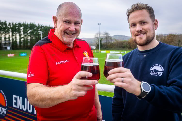 Club chair Paul Hayes with Jon Wide from Sharp’s Brewing Co.
