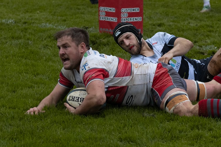 Camborne's Jordan Nicholls marks his 150th appearance with a crucial try in the top of the table victory over Luctonians. Picture: Steve Mock