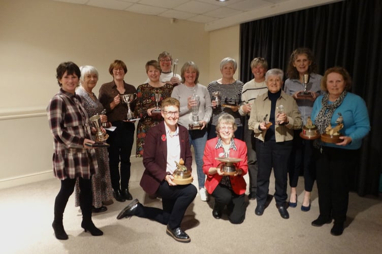 The presentation winners. Pictured kneeling are outgoing captain Sam Peach (left) and new skipper Cathryn Braithwaite. Picture: St Mellion Golf Club