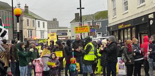 Farmers brave torrential rain to protest in Truro