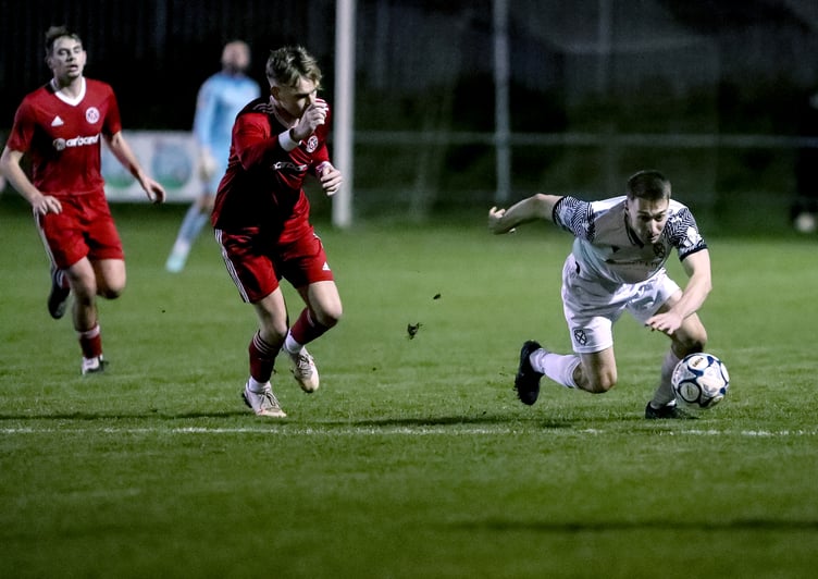 St Austell's Kieron Bishop (white), pictured during last week's Les Phillips Cup tie with Barnstaple Town, will be a key man going forward. Picture: Paul Williams