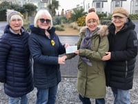 Residents show their appreciation for gardening group's efforts
