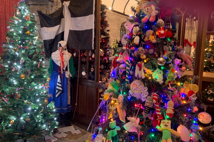 The knitted dolls on the Saltash Children's Appeal tree don't last long; they can be swapped for donations to the charity and the tree is replenished until they are all gone! (Picture: Sarah Martin)
