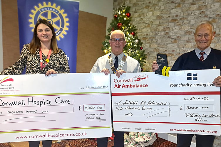 Club president Paul Hancock with Jane Appleton, of Cornwall Hospice Care, and David Earl, of Cornwall Air Ambulance.