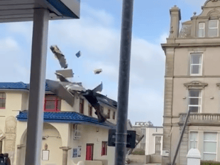 Man has lucky escape after part of restaurant roof blown off