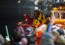 Santa swaps sleigh for lifeboat at Newlyn Harbour Lights switch on