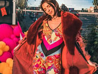 Fashion designer who helps dress the stars has returned to her roots 