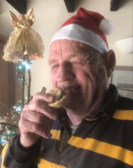 Jim Candy, Cornwall councillor for Looe West, Pelynt, Lansallos and Lanteglos, enjoying a festive treat