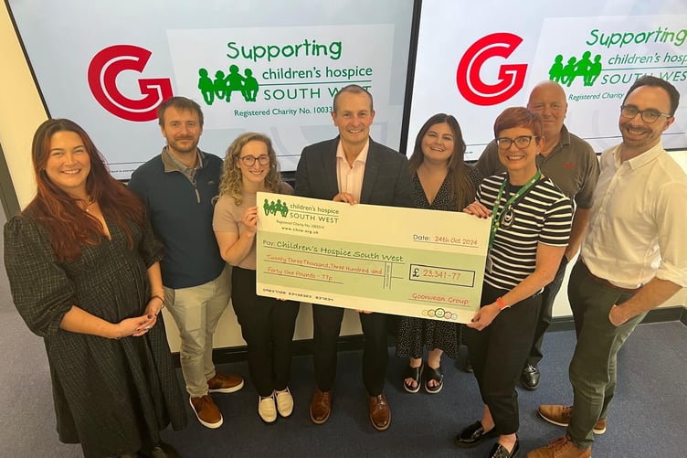 Goonvean group representatives Katie Crumpton, Samuel Hounsome, Katie Ovenden, Matthew Gazzard, Emma Newton, Doug Turnbull and Will Hartley with Hayley Wallbank.