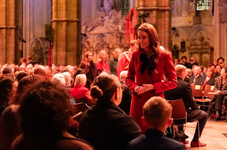 The Princess of Wales talks to guests at her annual Christmas Carol Service at Westminster Abbey
