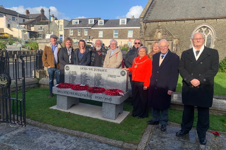 Saltash Town Council war memorial working group at one of two new benches to honour 77 'missed' war casualties, here with Saltash historian Barry Brooking and war grave volunteer Peter Clements. (Picture: Sarah Martin)