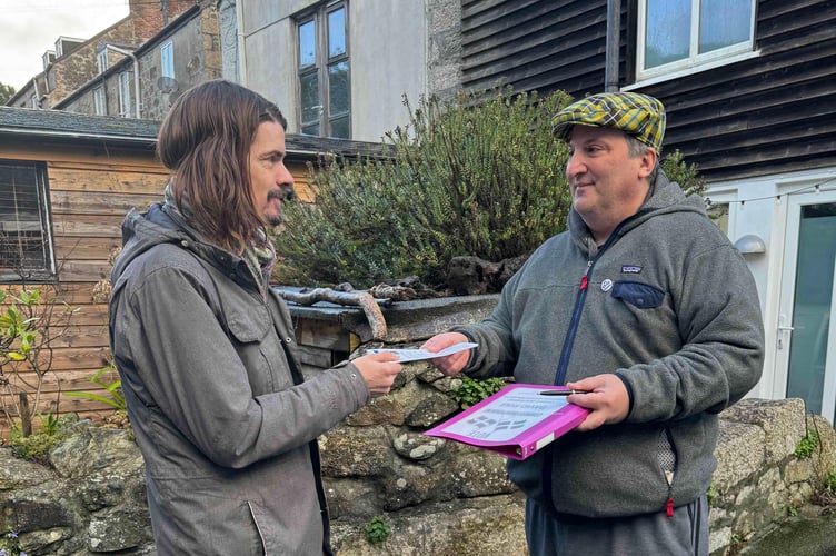 Helston South candidate David Rule, right, pictured canvassing. He says most people in the town don't even realise there's a by-election