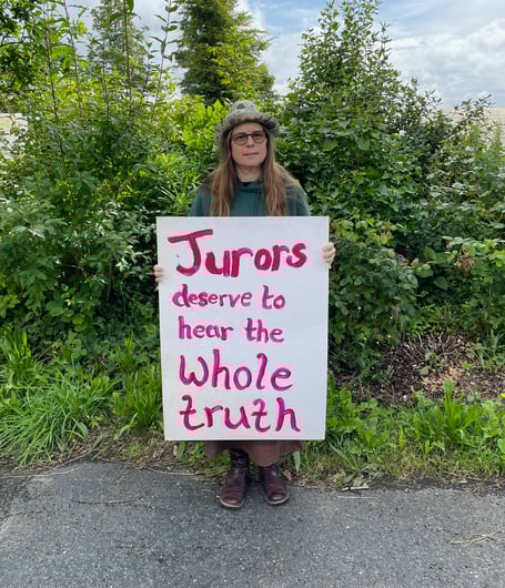 Supporters will be displaying a sign with "jurors deserve to hear the whole truth" in their windows 