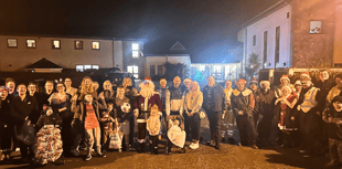 Decorated tractors deliver gifts from Par Market to children’s hospice
