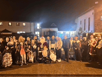 Decorated tractors deliver gifts from Par Market to children’s hospice