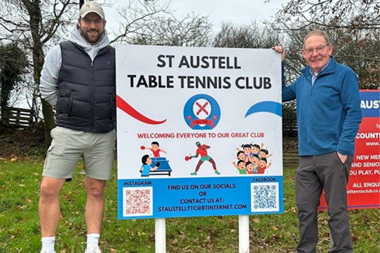 St Austell Table Tennis Club development and welfare officer Craig Mehew and chairman Allan Brooks with the new sign