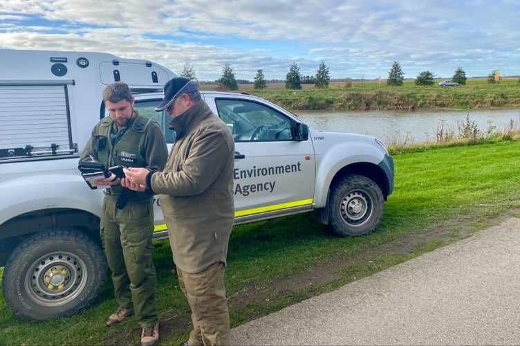 Enforcement officers out doing checks on rod licences.
