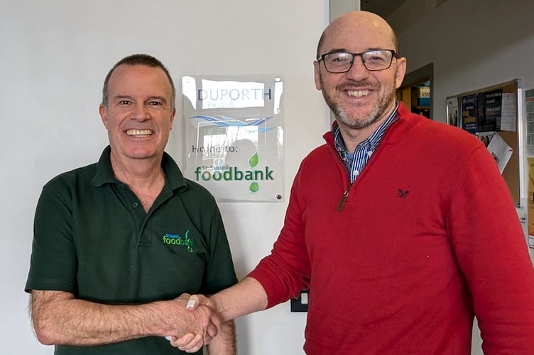 Cllr Michael Bunney is thanked at the St Austell Foodbank.