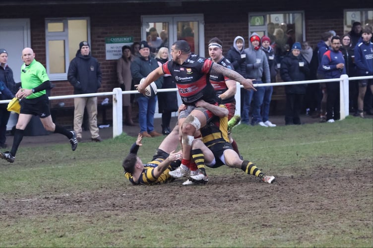 A superb one-handed offload from Josh Matavesi sets up Adam Hughes for the bonus point try in Camborne's win at Hinckley.