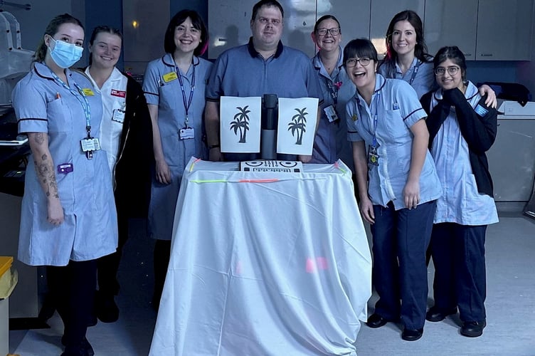 Marcus Williams  and the NHS staff from Radiotherapy, Oncology Bristol. Photo released February 11 2025. A dad lost all memory of his family and even forgot his own name as a result of an aggressive brain tumour - after being misdiagnosed with vertigo.Marcus Williams, 35, began experiencing intense headaches, fatigue, and seizures but doctors repeatedly misdiagnosed his symptoms for vertigo.The dad-of-one started to lose his memory - and couldn't recognise his daughter, Lola, five - and his wife, Laura, 31, pushed to get a CT scan.It revealed a large tumour and Marcus was rushed for emergency surgery to remove 98% of the mass - after being given hours to live.
