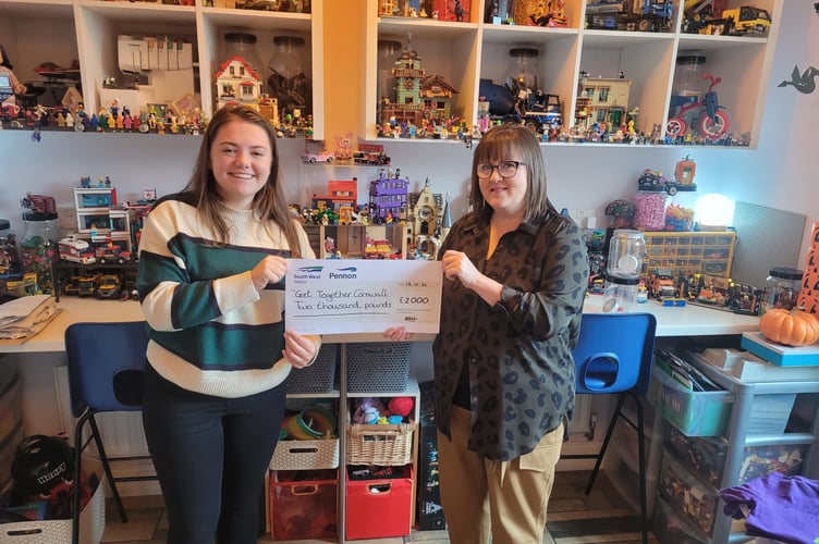 Get Together Cornwall, based in Liskeard, received a cheque for £2,000 from South West Water's Neighbourhood Fund