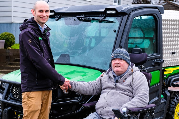 David Barnes with Paul Clemes and his adapted vehicle.