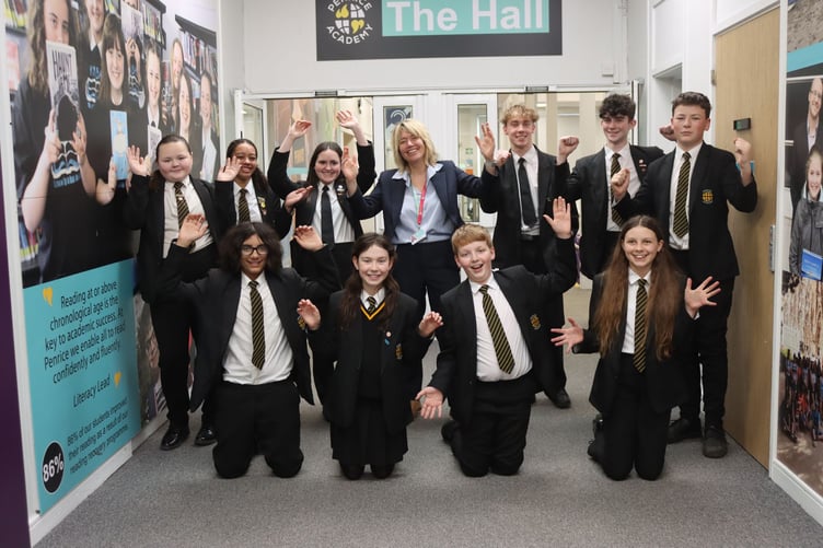Head of school Tanya Coleman celebrates with Penrice Academy pupils.