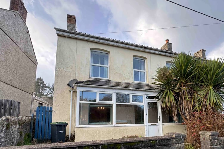 The three-bedroom house up for auction in Higher Bugle.