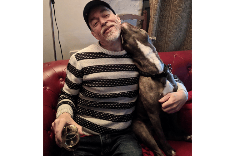 Luke with his devoted dog Buster.