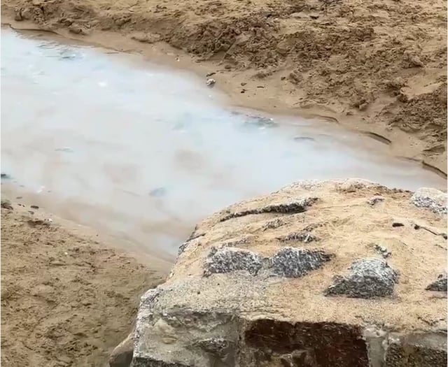 Suspected 'pollution discharge' at Porth Beach