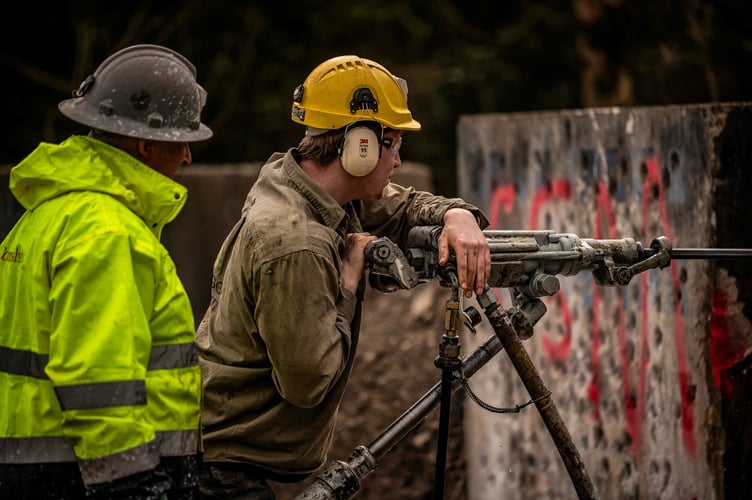 The CSM Men's Team practising airleg drilling for the International Mining Games
