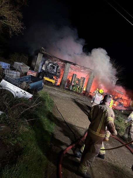 Firefighters deal with the blaze at a farm building at Blunts in the early hours of Sunday morning