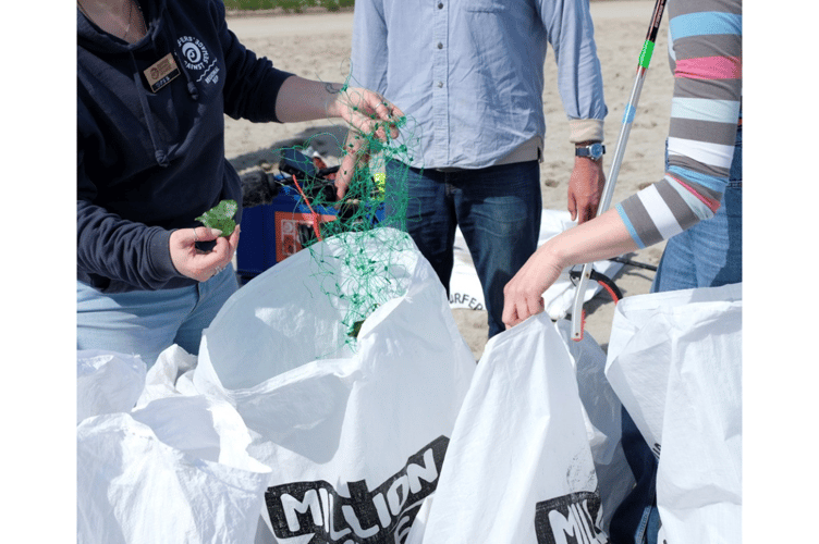 Falmouth volunteers tackle plastic waste in spring beach clean.