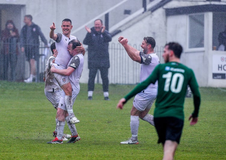St Austell's Neil Slateford celebrates his free-kick that sealed the 2-0 victory over St Blazey
