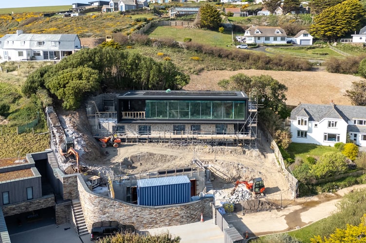 General views of on-going construction work at Cate Blanchett's house in Mawgan Porth, Cornwall, which has caused a stink with the locals, who say they can smell the portaloos on site, April 10 2025. Cate Blanchett has been accused of kicking up a stink during the building of her Cornish coastal mansion - by the stench of her portable toilets. The Hollywood actress has been building a five-bedroom Cornish eco-home and upset neighbours with the noise of construction works. But further complaints have now been received about the smell from the temporary toilets in place at the site - and a stench that is ruining the tranquility of visitors to the area. The Lord of the Rings star, 55, and her playwright husband Andrew Upton, 57, bought the £1.6 million cottage in Mawgan Porth in Cornwall. The original structure has since been demolished to replace it with a five-bedroom eco-home.