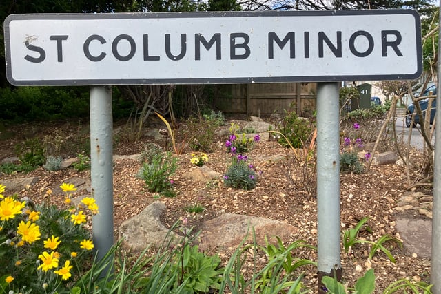 Green-fingered volunteers give village entrance a makeover