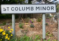 Green-fingered volunteers give village entrance a makeover