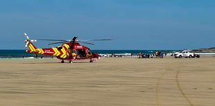 Injured surfer airlifted to hospital